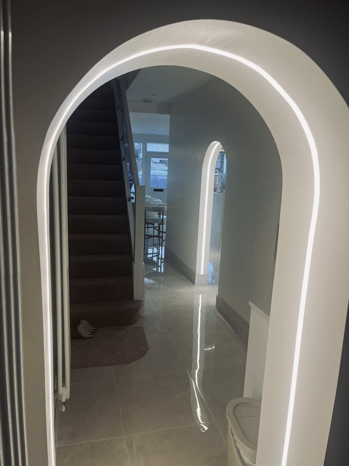 LED arched doorway lighting in a refurbished home