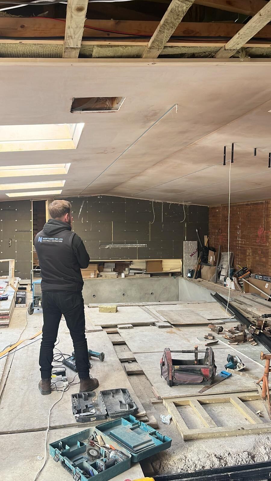 Northern Tec engineer carrying out a commercial first-fix electrical installation