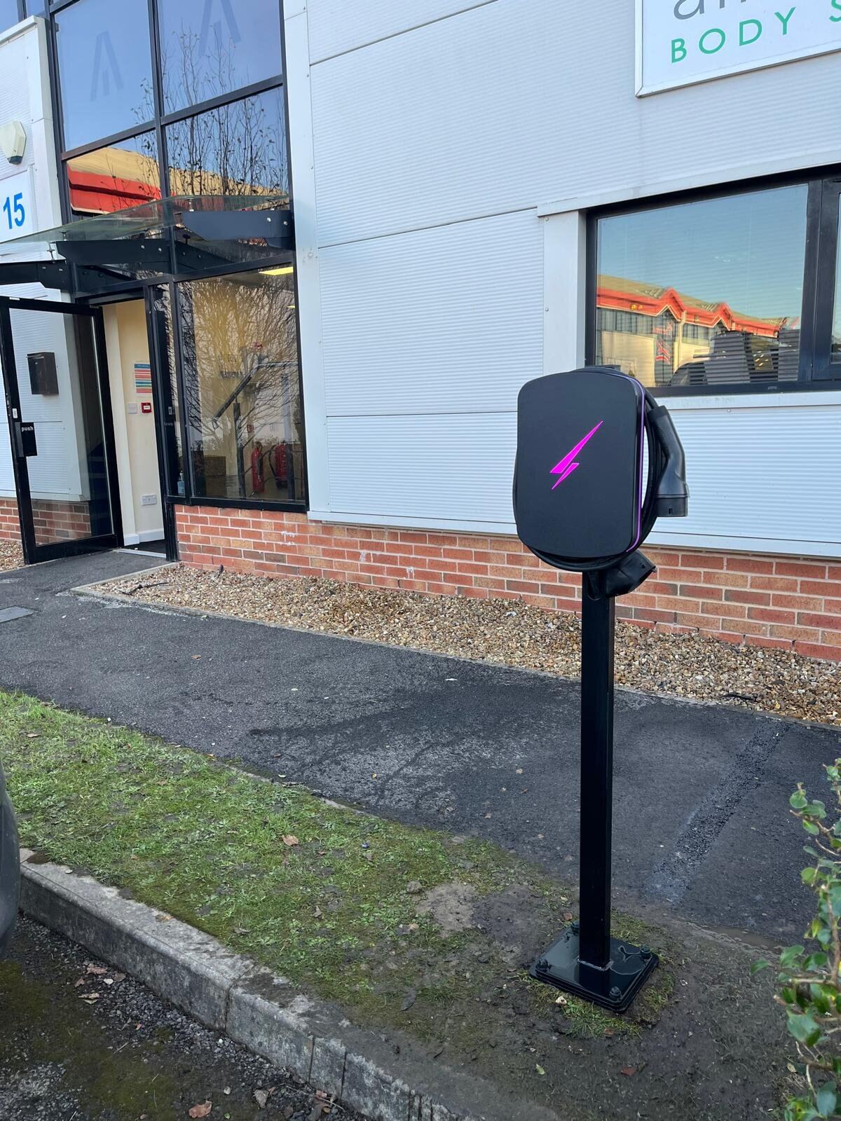 Pedestal-mounted commercial EV charge point installed outside a Lancashire business unit by Northern Tec