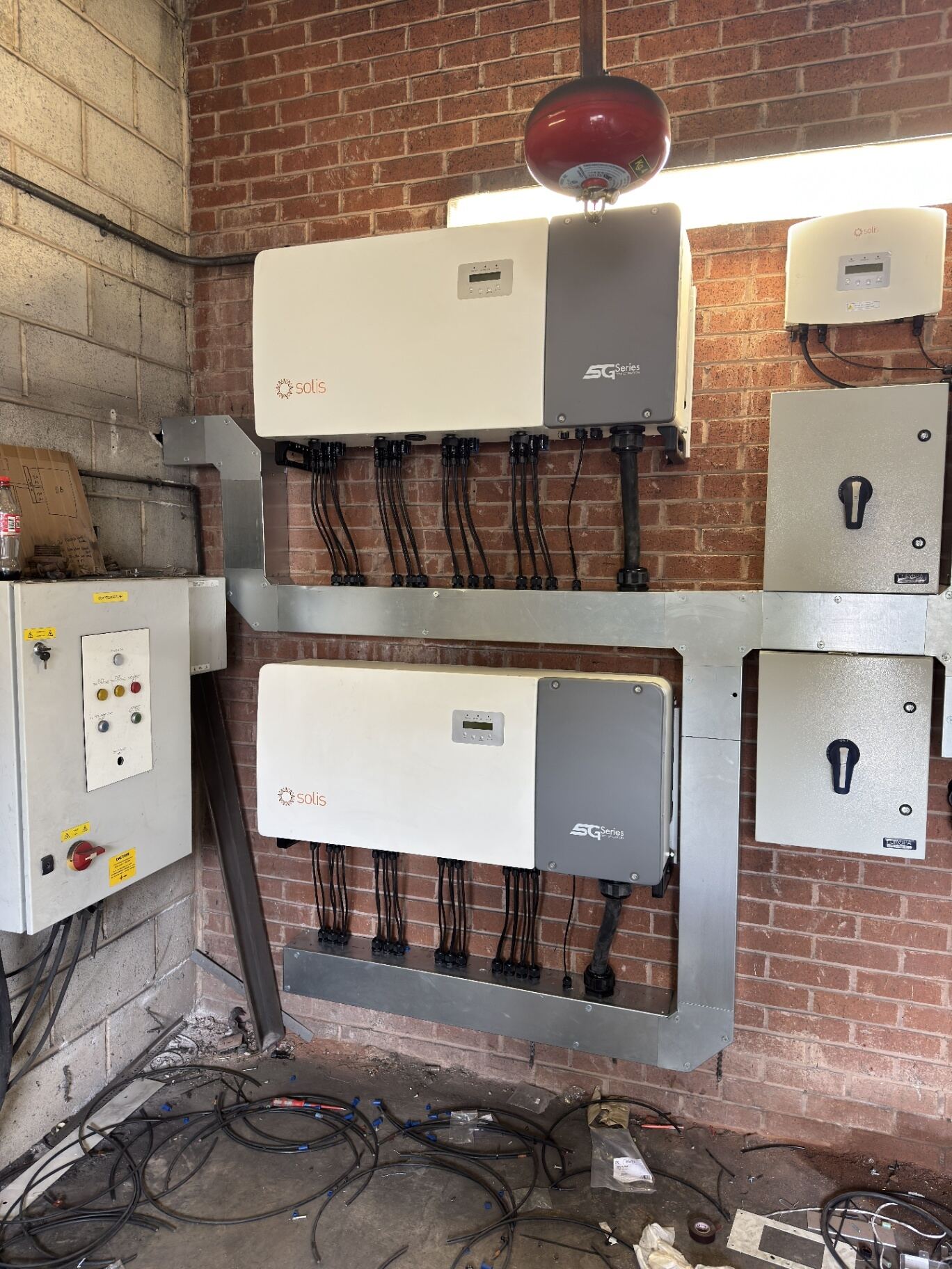 Commercial-grade EV charger being installed and commissioned